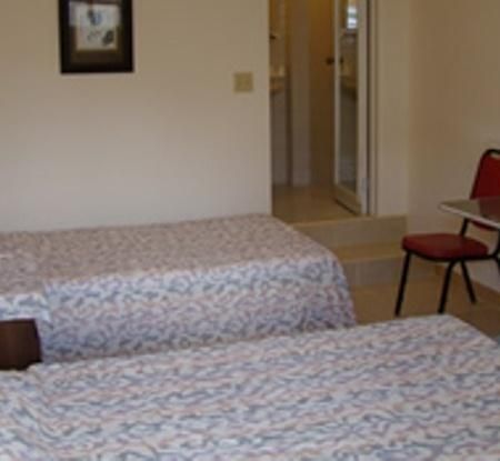 Micro Beach Hotel Garapan Pokoj fotografie